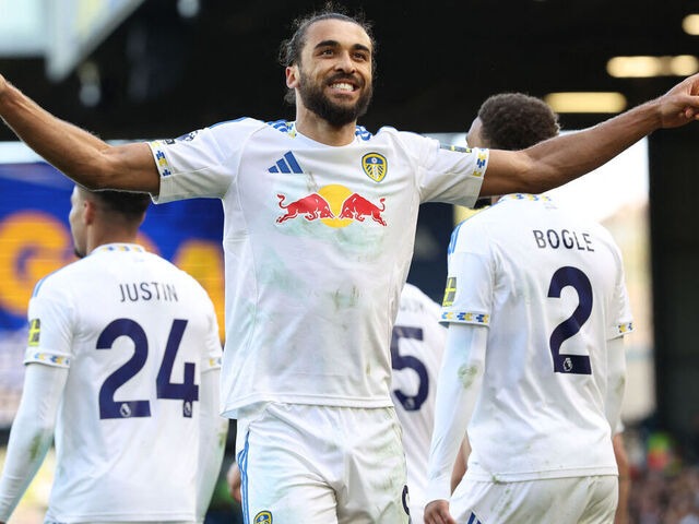 Leeds United's English striker #09 Dominic Calvert-Lewin celebrates after scoring their third goal from the penalty spot during the English Premier League football match between Leeds United and Wolverhampton Wanderers at Elland Road in Leeds, northern England on April 18, 2026. / RESTRICTED TO EDITORIAL USE. No use with unauthorized audio, video, data, fixture lists, club/league logos or 'live' services. Online in-match use limited to 120 images. An additional 40 images may be used in extra time. No video emulation. Social media in-match use limited to 120 images. An additional 40 images may be used in extra time. No use in betting publications, games or single club/league/player publications. /
