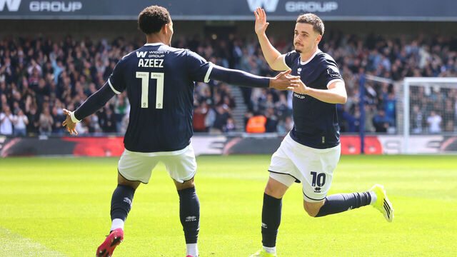 Millwall's Camiel Neghli (right) celebrates scoring their side's second goal of the game with team-mate Femi Azeez during the Sky Bet Championship match at The Den, London. Picture date: Saturday April 18, 2026.