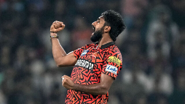 TOPSHOT - Sunrisers Hyderabad's Eshan Malinga celebrates after taking the wicket of Royal Challengers Bengaluru's Tim David during the Indian Premier League (IPL) Twenty20 cricket match between Royal Challengers Bengaluru and Sunrisers Hyderabad at the Ekana Cricket Stadium in Lucknow on May 23, 2025.