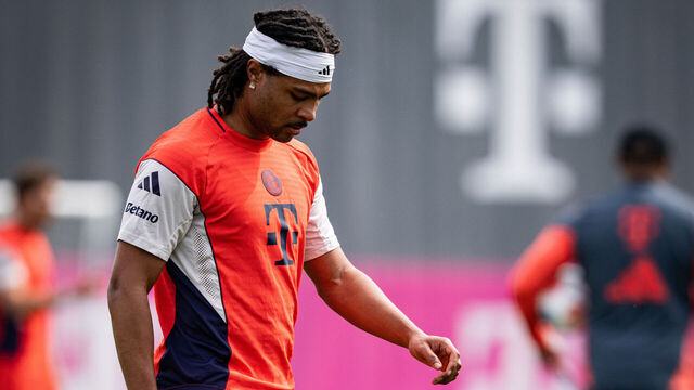 MUNICH, GERMANY - APRIL 18: (EDITORS NOTE: Image has been digitally enhanced.) Serge Gnabry of FC Bayern Muenchencontrols the ball during a training session at on April 18, 2026 in Munich, Germany.