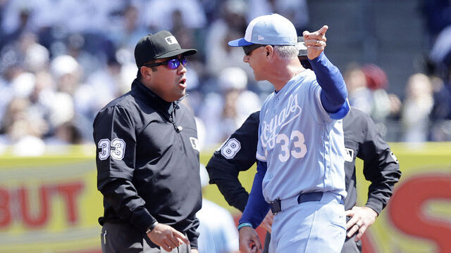 NEW YORK, NEW YORK - APRIL 18: Manager Matt Quatraro #33 of the Kansas City Royals argues with umpire Nestor Ceja #33 after he was thrown out of the game between the Kansas City Royals and the New York Yankees in the first inning at Yankee Stadium on April 18, 2026 in New York City.