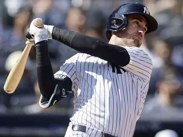 NEW YORK, NEW YORK - APRIL 18: Cody Bellinger #35 of the New York Yankees follows through on his sixth inning two-run home run against the Kansas City Royals at Yankee Stadium on April 18, 2026 in New York City.