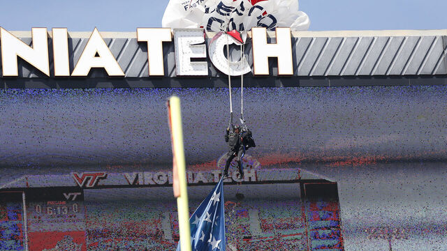BLACKSBURG, VA - APRIL 18: A paratrooper crashed after high winds blew him into the jumbotron prior to the Virginia Tech spring football game on April 18, 2026, at Lane Stadium in Blacksburg, VA.