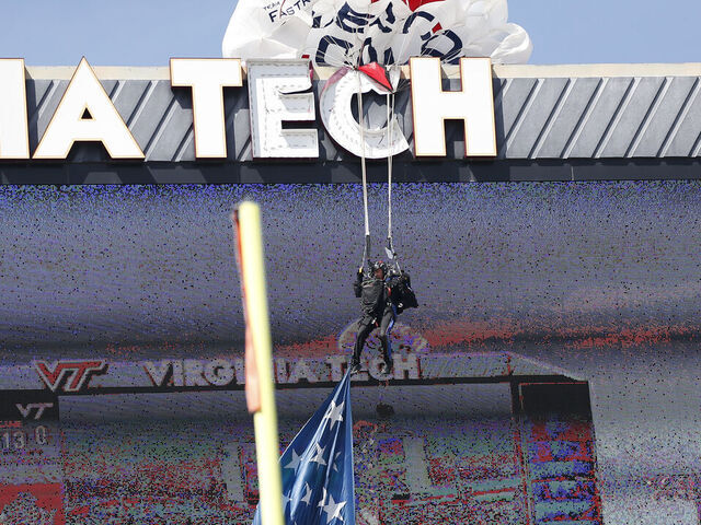 BLACKSBURG, VA - APRIL 18: A paratrooper crashed after high winds blew him into the jumbotron prior to the Virginia Tech spring football game on April 18, 2026, at Lane Stadium in Blacksburg, VA.