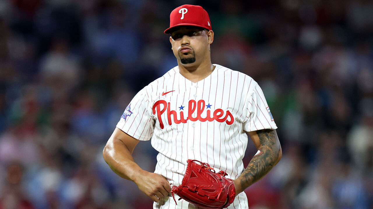 PHILADELPHIA, PENNSYLVANIA - MARCH 31: Jhoan Duran #59 of the Philadelphia Phillies pitches during a game against the Washington Nationals at Citizens Bank Park on March 31, 2026 in Philadelphia, Pennsylvania.