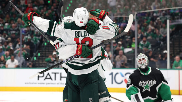 DALLAS, TEXAS - APRIL 18: Matt Boldy #12 of the Minnesota Wild is congratulated by Kirill Kaprizov #97 following a goal against the Dallas Stars during the second period of Game One of the First Round of the 2026 Stanley Cup Playoffs at the American Airlines Center on April 18, 2026 in Dallas, Texas.