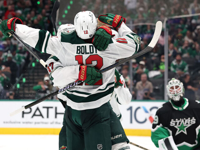 DALLAS, TEXAS - APRIL 18: Matt Boldy #12 of the Minnesota Wild is congratulated by Kirill Kaprizov #97 following a goal against the Dallas Stars during the second period of Game One of the First Round of the 2026 Stanley Cup Playoffs at the American Airlines Center on April 18, 2026 in Dallas, Texas.