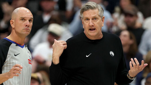 DENVER, COLORADO - APRIL 18: Head coach Chris Finch of the Minnesota Timberwolves questions a call with Jacyn Goble #68 as his team plays the Denver Nuggets in the first quarter during Game One of the First Round of the NBA Western Conference Playoffs at Ball Arena on April 18, 2026 in Denver, Colorado.
