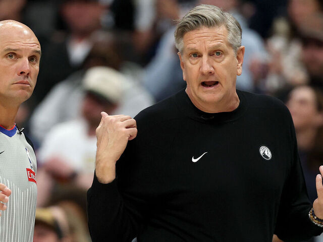 DENVER, COLORADO - APRIL 18: Head coach Chris Finch of the Minnesota Timberwolves questions a call with Jacyn Goble #68 as his team plays the Denver Nuggets in the first quarter during Game One of the First Round of the NBA Western Conference Playoffs at Ball Arena on April 18, 2026 in Denver, Colorado.