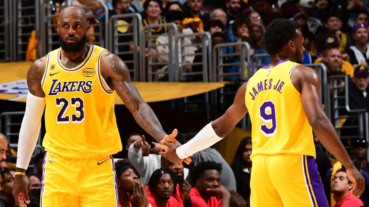 LOS ANGELES, CA - APRIL 18: Bronny James #9 and LeBron James #23 of the Los Angeles Lakers high five during the game against the Houston Rockets during Round One Game One of the 2026 NBA Playoffs on April 18, 2026 at Crypto.Com Arena in Los Angeles, California. NOTE TO USER: User expressly acknowledges and agrees that, by downloading and/or using this Photograph, user is consenting to the terms and conditions of the Getty Images License Agreement. Mandatory Copyright Notice: Copyright 2026 NBAE