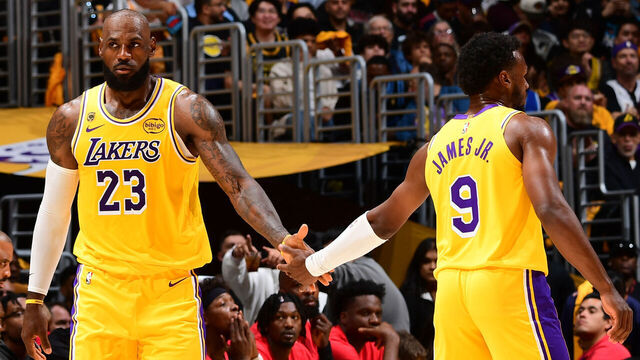 LOS ANGELES, CA - APRIL 18: Bronny James #9 and LeBron James #23 of the Los Angeles Lakers high five during the game against the Houston Rockets during Round One Game One of the 2026 NBA Playoffs on April 18, 2026 at Crypto.Com Arena in Los Angeles, California. NOTE TO USER: User expressly acknowledges and agrees that, by downloading and/or using this Photograph, user is consenting to the terms and conditions of the Getty Images License Agreement. Mandatory Copyright Notice: Copyright 2026 NBAE