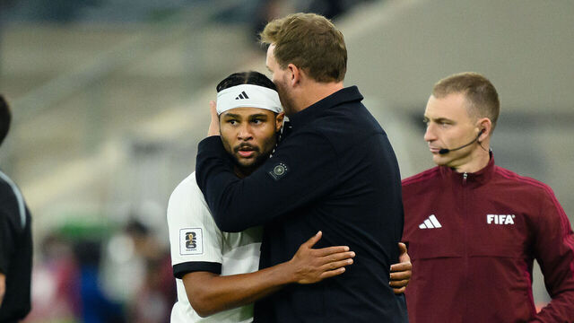 SINSHEIM, GERMANY - OCTOBER 10: Serge Gnabry of Germany with Head coach Julian Nagelsmann of Germany during the FIFA World Cup 2026 qualifier match between Germany and Luxembourg at PreZero-Arena on October 10, 2025 in Sinsheim, Germany.
