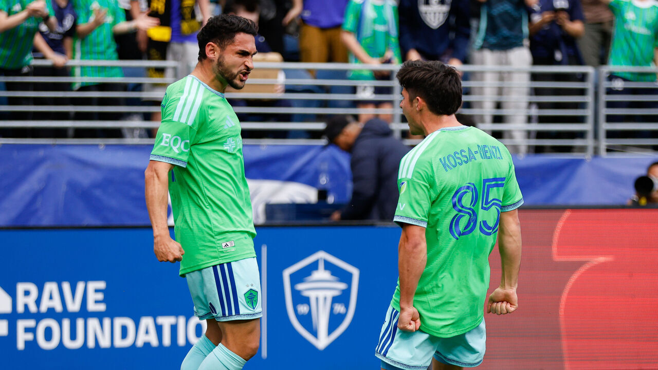 SEATTLE, WA - APRIL 18: Midfielder Cristian Roldan #7 of the Seattle Sounders celebrates with teammate defender Kalani Kossa-Rienzi #85 after scoring a goal during a game between St. Louis City and the Seattle Sounders on April 18, 2026 at Lumen Field in Seattle, Washington.