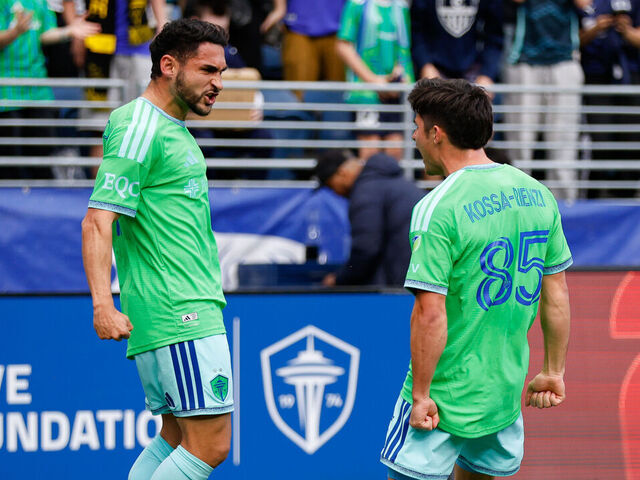 SEATTLE, WA - APRIL 18: Midfielder Cristian Roldan #7 of the Seattle Sounders celebrates with teammate defender Kalani Kossa-Rienzi #85 after scoring a goal during a game between St. Louis City and the Seattle Sounders on April 18, 2026 at Lumen Field in Seattle, Washington.