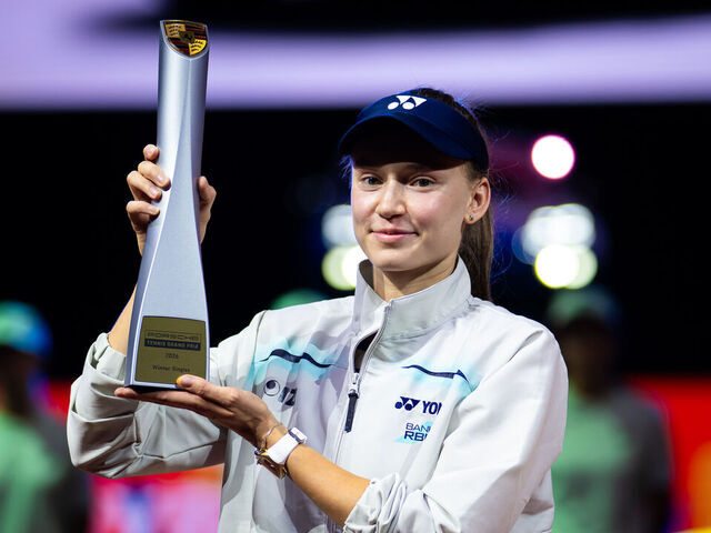STUTTGART, GERMANY - APRIL 19: Elena Rybakina of Kazakhstan poses with the champions trophy after defeating Karolina Muchova of the Czech Republic in the singles final on Day Seven of the Porsche Tennis Grand Prix at Porsche Arena on April 19, 2026 in Stuttgart, Germany