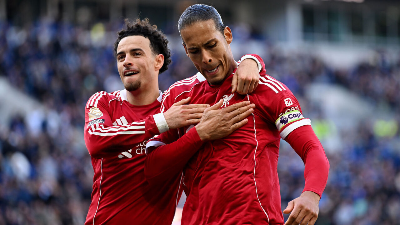 LIVERPOOL, ENGLAND - APRIL 19: (THE SUN OUT, THE SUN ON SUNDAY OUT) Virgil van Dijk of Liverpool celebrates scoring his team's second goal with teammate Curtis Jones during the Premier League match between Everton and Liverpool at Hill Dickinson Stadium on April 19, 2026 in Liverpool, England.