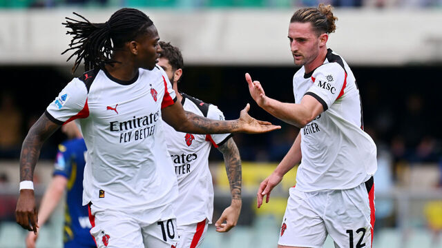 VERONA, ITALY - APRIL 19: Adrien Rabiot of AC Milan celebrates scoring his team's first goal with teammate Rafael Leao during the Serie A match between Hellas Verona FC and AC Milan at Stadio Marcantonio Bentegodi on April 19, 2026 in Verona, Italy.