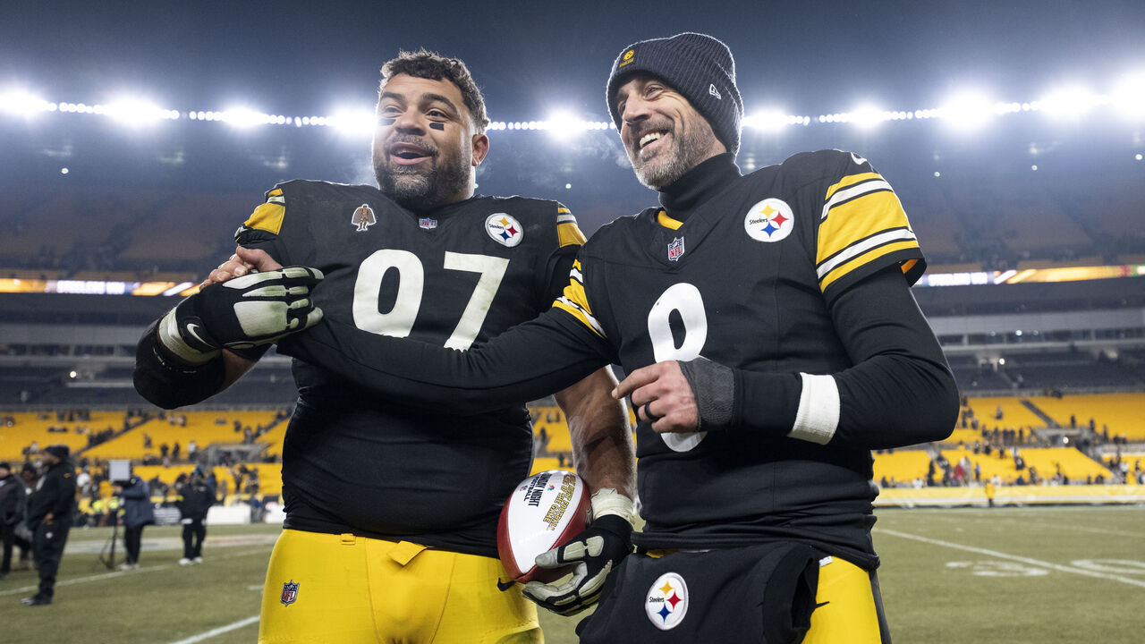 PITTSBURGH, PENNSYLVANIA - JANUARY 4: Cameron Heyward #97 of the Pittsburgh Steelers and Aaron Rodgers #8 of the Pittsburgh Steelers react following an NFL football game against the Baltimore Ravens at Acrisure Stadium on January 04, 2026 in Pittsburgh, Pennsylvania.