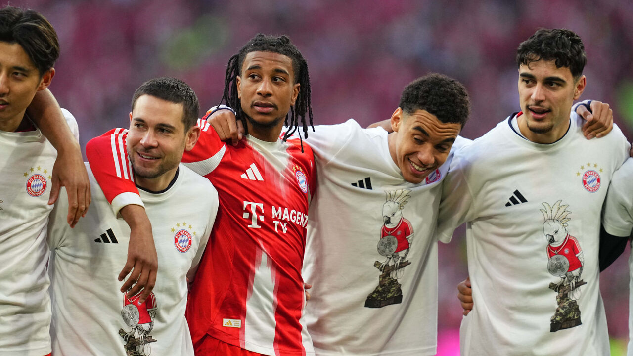 Jamal Musiala (Bayern Munich) and Michael Olise (Bayern Munich) celebrate during Matchday 30 1.Bundesliga: Bayern Munich and Stuttgart at Allianz Arena, Munich, Germany on April 19 2026.