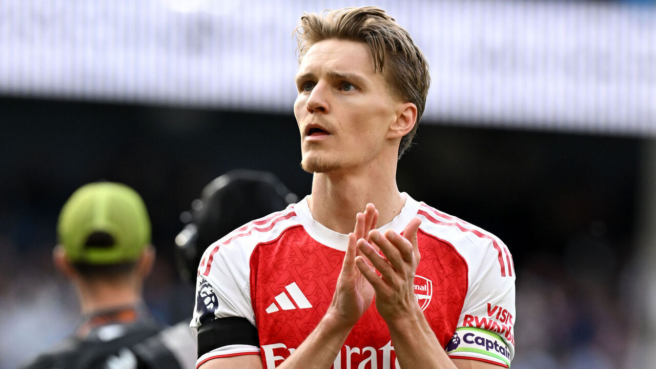 MANCHESTER, ENGLAND - APRIL 19: Martin Odegaard of Arsenal applauds the fans after the Premier League match between Manchester City and Arsenal at Etihad Stadium on April 19, 2026 in Manchester, England.