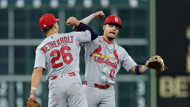 HOUSTON, TEXAS - APRIL 19: Masyn Winn #0 and JJ Wetherholt #26 of the St. Louis Cardinals celebrate after defeating the Houston Astros in the game at Daikin Park on April 19, 2026 in Houston, Texas.