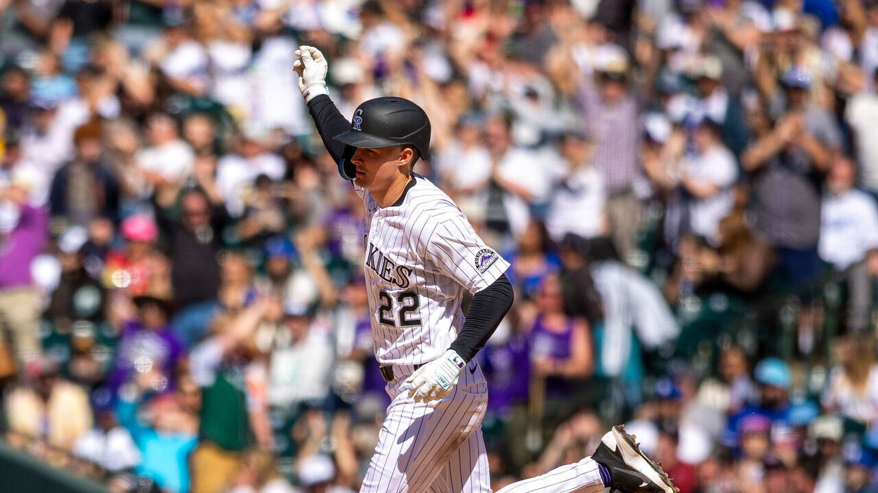 DENVER, CO - APRIL 19: Mickey Moniak #22 of the Colorado Rockies celebrates as he rounds the bases after hitting a two-run home run in the seventh inning during the game between the Los Angeles Dodgers and the Colorado Rockies at Coors Field on Sunday, April 19, 2026 in Denver, Colorado.