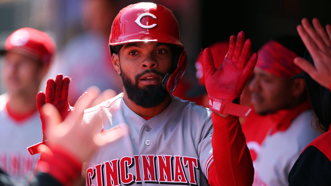 MINNEAPOLIS, MINNESOTA - APRIL 18: Rece Hinds #57 of the Cincinnati Reds celebrates scoring a run on an RBI single by teammate Elly de la Cruz #44 (not pictured) against the Minnesota Twins in the seventh inning at Target Field on April 18, 2026 in Minneapolis, Minnesota. The Reds defeated the Twins 5-4.