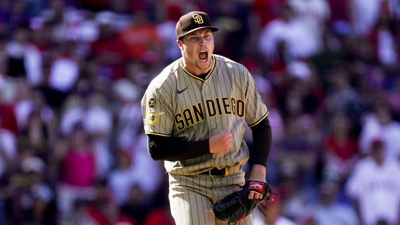 ANAHEIM, CA - APRIL 19: Mason Miller #22 of the San Diego Padres celebrates after defeating the Los Angeles Angels at Angel Stadium of Anaheim on Sunday, April 19, 2026 in Anaheim, California.