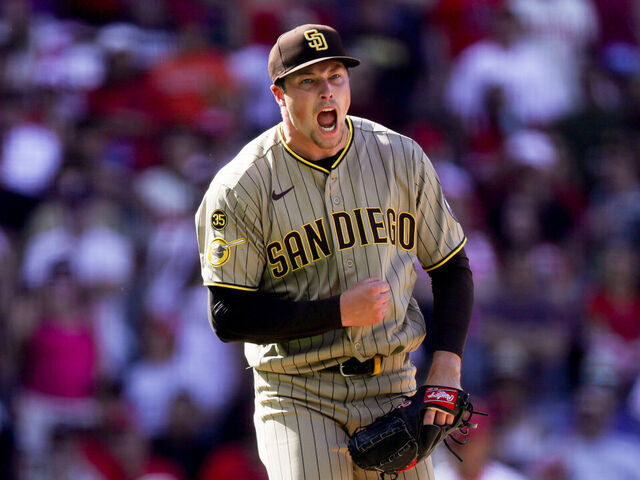 ANAHEIM, CA - APRIL 19: Mason Miller #22 of the San Diego Padres celebrates after defeating the Los Angeles Angels at Angel Stadium of Anaheim on Sunday, April 19, 2026 in Anaheim, California.