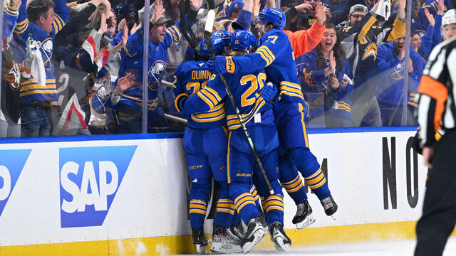 BUFFALO, NEW YORK - APRIL 19: Mattias Samuelsson #23 of the Buffalo Sabres celebrates with teammates after scoring during the third period in Game One of the First Round of the 2026 Stanley Cup Playoffs against the Boston Bruins at KeyBank Center on April 19, 2026 in Buffalo, New York. Buffalo won, 4-3.