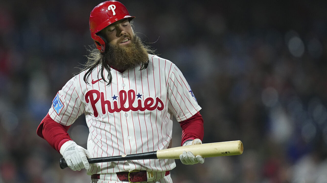 PHILADELPHIA, PENNSYLVANIA - APRIL 19: Brandon Marsh #16 of the Philadelphia Phillies reacts after flying out in the bottom of the sixth inning against the Atlanta Braves at Citizens Bank Park on April 19, 2026 in Philadelphia, Pennsylvania. The Braves defeated the Phillies 4-2.