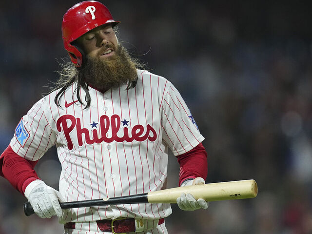 PHILADELPHIA, PENNSYLVANIA - APRIL 19: Brandon Marsh #16 of the Philadelphia Phillies reacts after flying out in the bottom of the sixth inning against the Atlanta Braves at Citizens Bank Park on April 19, 2026 in Philadelphia, Pennsylvania. The Braves defeated the Phillies 4-2.
