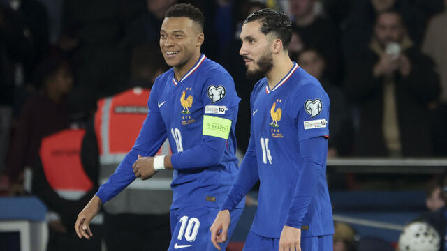 PARIS, FRANCE - NOVEMBER 13: Kylian Mbappe of France celebrates his goal with Ryan Cherki of France during the FIFA World Cup 2026 qualifier football match between France and Ukraine at Parc des Princes stadium on November 13, 2025 in Paris, France.