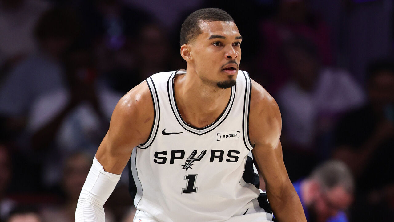 MIAMI, FLORIDA - MARCH 23: Victor Wembanyama #1 of the San Antonio Spurs looks on during the first quarter of the game against the Miami Heat at Kaseya Center on March 23, 2026 in Miami, Florida.