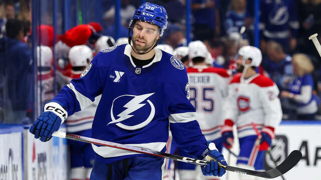 TAMPA, FL - APRIL 19: Brandon Hagel #38 of the Tampa Bay Lightning reacts as members of the Montréal Canadiens celebrate the game winning-goal in the overtime period of Game One of the First Round of the 2026 Stanley Cup Playoffs at the Benchmark International Arena on April 19, 2026 in Tampa, Florida.