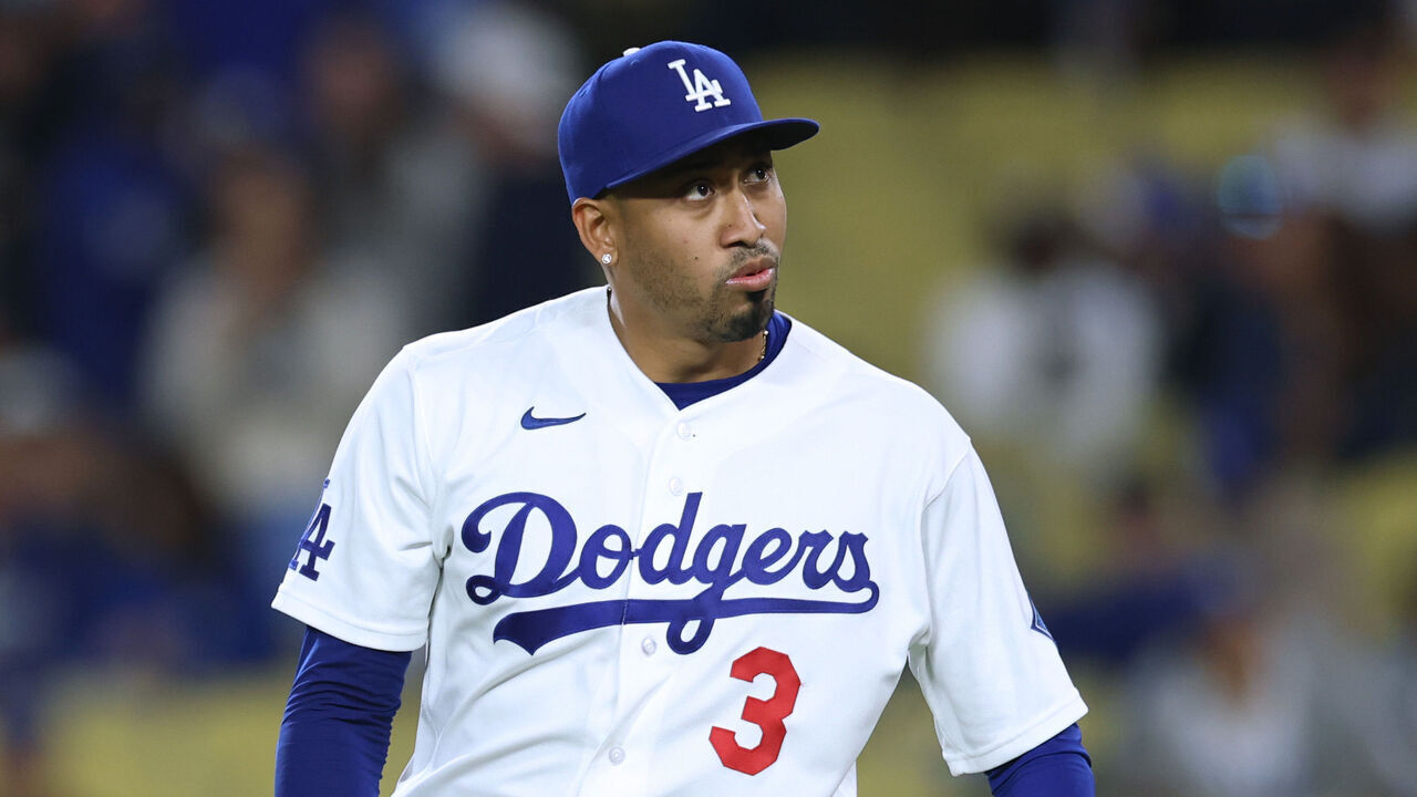 LOS ANGELES, CALIFORNIA - APRIL 10: Edwin Díaz #3 of the Los Angeles Dodgers reacts after an RBI singe from Ezequiel Duran #20 of the Texas Rangers to score Sam Haggerty #0, to tie the game 7-7, during the ninth inning at Dodger Stadium on April 10, 2026 in Los Angeles, California.