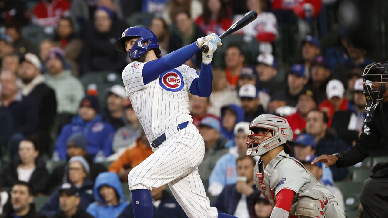 CHICAGO, ILLINOIS - APRIL 20: Dansby Swanson #7 of the Chicago Cubs hits a three-run home run in the second inning against the Philadelphia Phillies at Wrigley Field on April 20, 2026 in Chicago, Illinois.