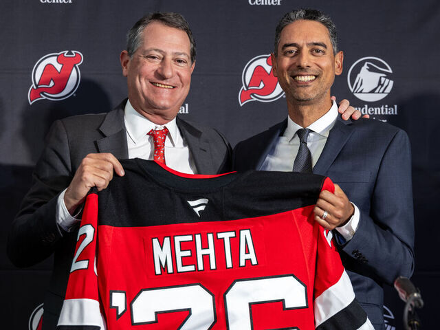 NEWARK, NEW JERSEY - APRIL 21: The New Jersey Devils owner David Blitzer poses with new General Manager Sunny Mehta at Prudential Center on April 21, 2026 in Newark, New Jersey.