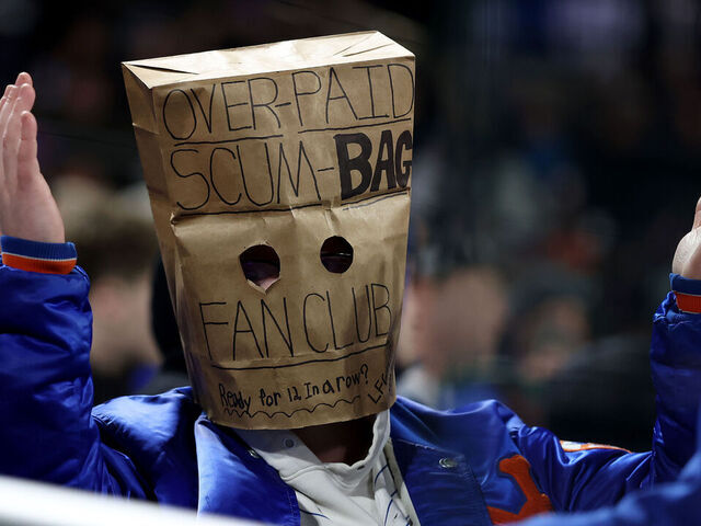NEW YORK, NEW YORK - APRIL 21: (EDITOR'S NOTE: Image contains profanity.) A New York Mets fan expresses frustration during the game against the Minnesota Twins at Citi Field on April 21, 2026 in the Flushing neighborhood of the Queens borough of New York City.