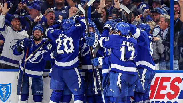TAMPA, FL - APRIL 21: Members of the Tampa Bay Lightning celebrate the game-winning goal against the Montréal Canadiens during the overtime period of Game Two of the First Round of the 2026 Stanley Cup Playoffs at the Benchmark International Arena on April 21, 2026 in Tampa, Florida.
