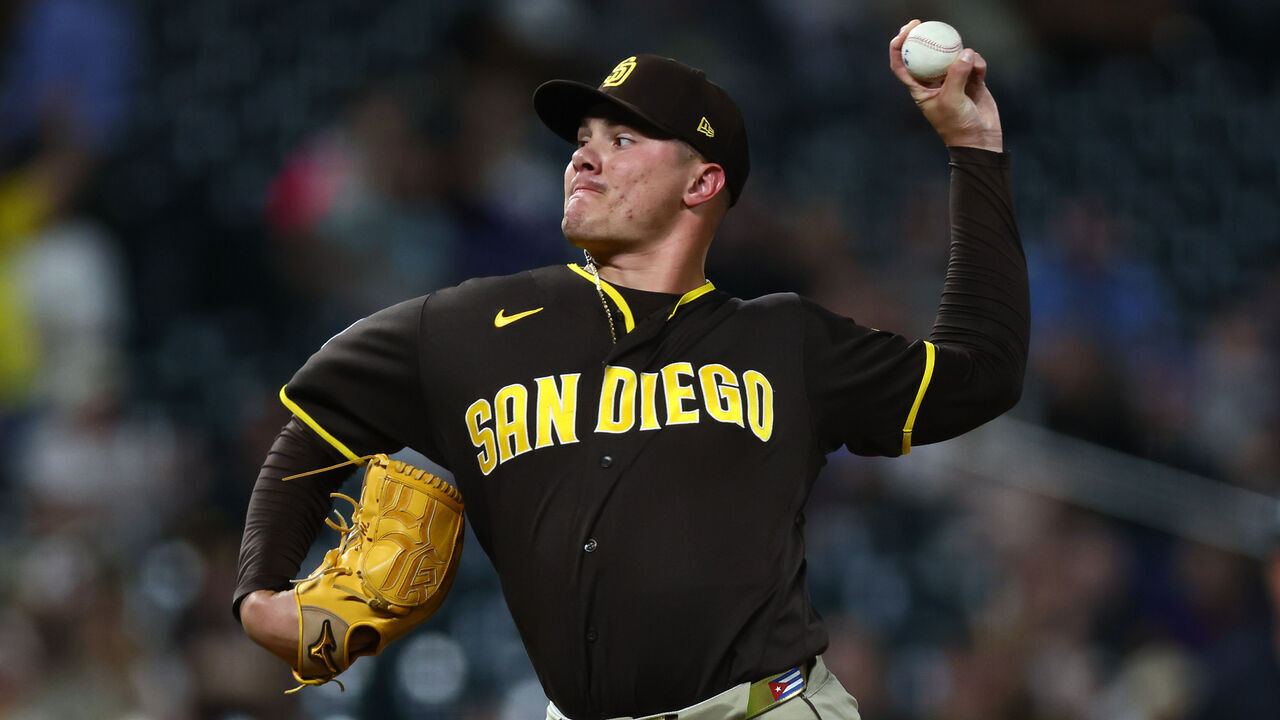 DENVER, CO - APRIL 21: Adrian Morejon #50 of the San Diego Padres delivers a pitch in the ninth inning against the Colorado Rockies at Coors Field on April 21, 2026 in Denver, Colorado.