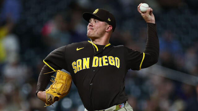 DENVER, CO - APRIL 21: Adrian Morejon #50 of the San Diego Padres delivers a pitch in the ninth inning against the Colorado Rockies at Coors Field on April 21, 2026 in Denver, Colorado.