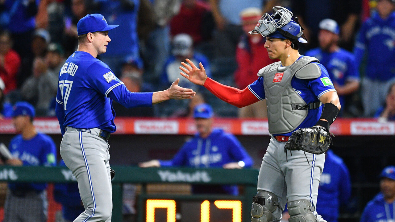 ANAHEIM, CA - APRIL 21: Toronto Blue Jays pitcher Louis Varland (77) celebrates with with Toronto Blue Jays catcher Brandon Valenzuela (59) after the MLB game between the Toronto Blue Jays the Los Angeles Angels on April 21, 2026 at Angel Stadium in Anaheim, CA.