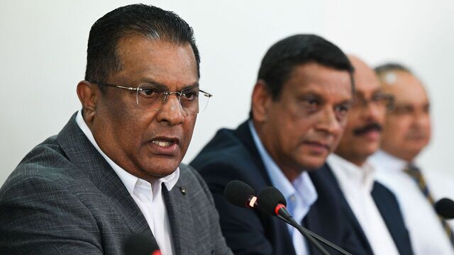 President of Sri Lanka Cricket Shammi Silva (L) speaks during a press conference at the Sri Lanka Cricket board office, in Colombo on November 22, 2023. Sri Lanka has been stripped of the Under-19 World Cup next year, the International Cricket Council said November 21, after suspending the island nation's board over alleged political meddling.