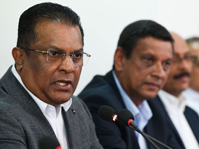 President of Sri Lanka Cricket Shammi Silva (L) speaks during a press conference at the Sri Lanka Cricket board office, in Colombo on November 22, 2023. Sri Lanka has been stripped of the Under-19 World Cup next year, the International Cricket Council said November 21, after suspending the island nation's board over alleged political meddling.
