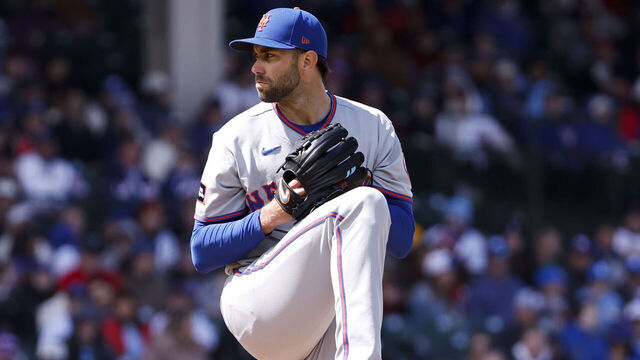 CHICAGO, ILLINOIS - APRIL 19: David Peterson #23 of the New York Mets prepares to deliver a pitch in a game against the Chicago Cubs at Wrigley Field on April 19, 2026 in Chicago, Illinois.