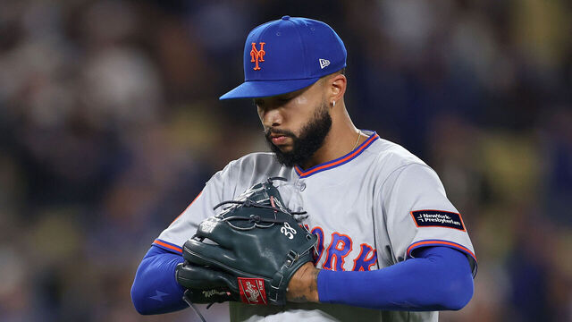 LOS ANGELES, CALIFORNIA - APRIL 15: Devin Williams #38 of the New York Mets reacts as he exits the game against the Los Angeles Dodgers during the eighth inning at Dodger Stadium on April 15, 2026 in Los Angeles, California. All players are wearing the number 42 in honor of Jackie Robinson Day.