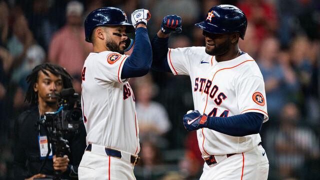 HOUSTON, TEXAS - APRIL 18: Yordan Alvarez #44 of the Houston Astros celebrates with Carlos Correa #1 at home plate after hitting a solo home run in the first inning during a game against the St. Louis Cardinals at Daikin Park on April 18, 2026 in Houston, Texas.