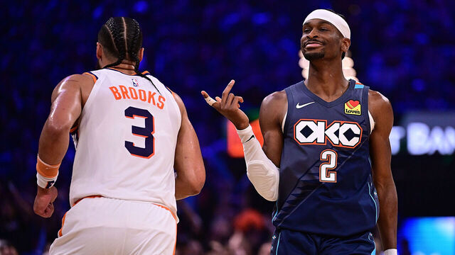 OKLAHOMA CITY, OKLAHOMA - APRIL 22: Shai Gilgeous-Alexander #2 of the Oklahoma City Thunder gestures towards Dillon Brooks #3 of the Phoenix Suns during the first half in Game Two of the Western Conference First Round NBA Playoffs at Paycom Center on April 22, 2026 in Oklahoma City, Oklahoma.