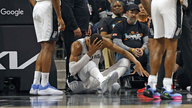 SAN ANTONIO, TX -APRIL 21: Victor Wembanyama #1 of the San Antonio Spurs holds his head after falling to the court against the Portland Trailblazers in the first half of Game Two of the Western Conference First Round NBA Playoffs at Frost Bank Center on April 21, 2026 in San Antonio, Texas. NOTE TO USER: User expressly acknowledges and agrees that, by downloading and or using this photograph, User is consenting to terms and conditions of the Getty Images License Agreement.